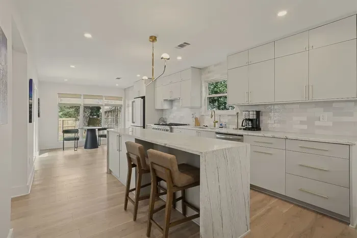 Modern luxury meets open-concept living. The perfect space to cook, gather, and unwind together.