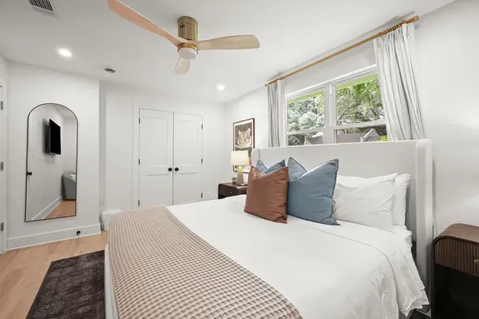 Wake up refreshed in this bright and spacious primary bedroom, thoughtfully designed for comfort and relaxation.