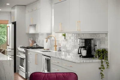 The open-concept kitchen makes preparing meals easy and enjoyable.