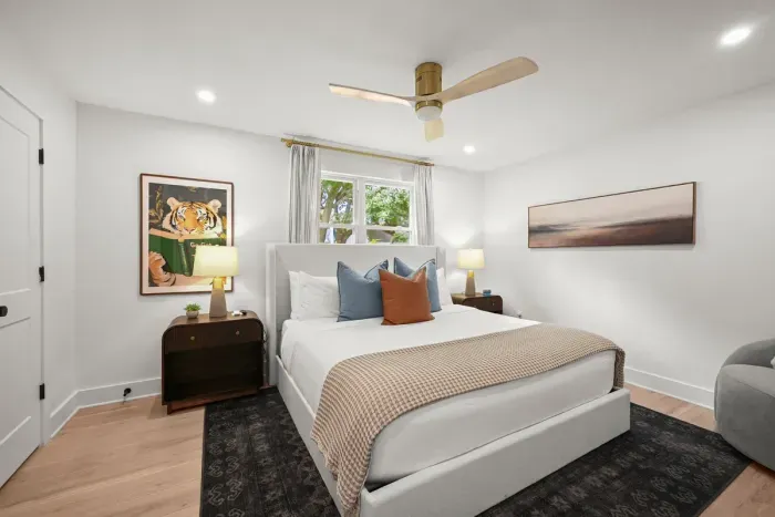 Rest easy in the comfortable primary bedroom with thoughtful touches.