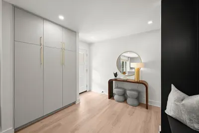 Contemporary entryway designed to make you feel at home.
