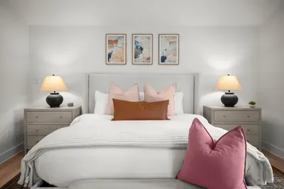 Enjoy a peaceful night's sleep in the beautifully appointed primary bedroom.