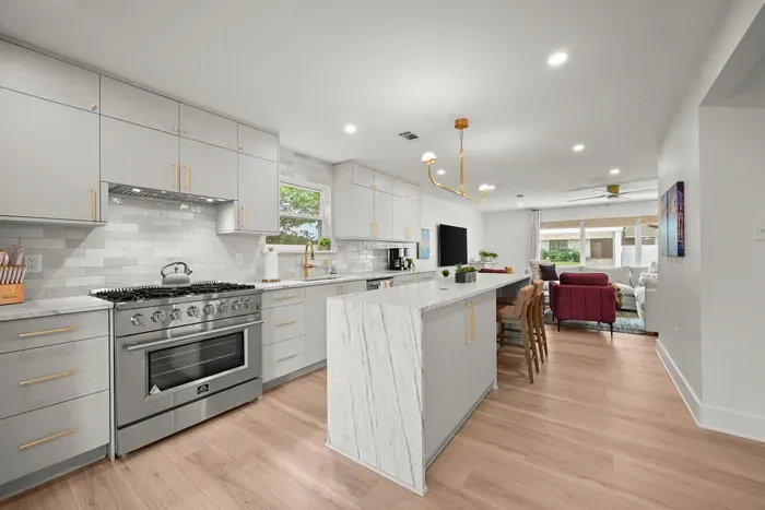 Bright, modern kitchen with full-size appliances and ample counter space.
