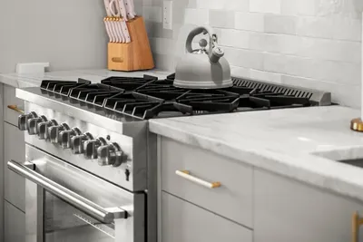 Well-equipped kitchen with premium cooking appliances.