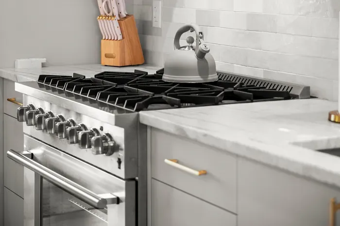 Well-equipped kitchen with premium cooking appliances.