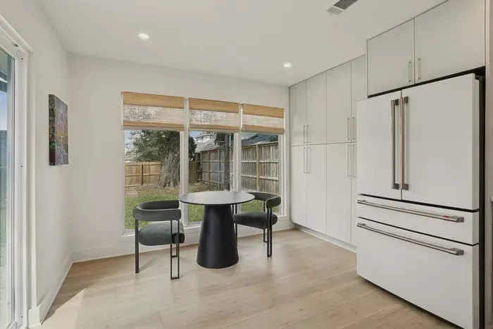 Morning coffee tastes better with natural light and peaceful backyard views.