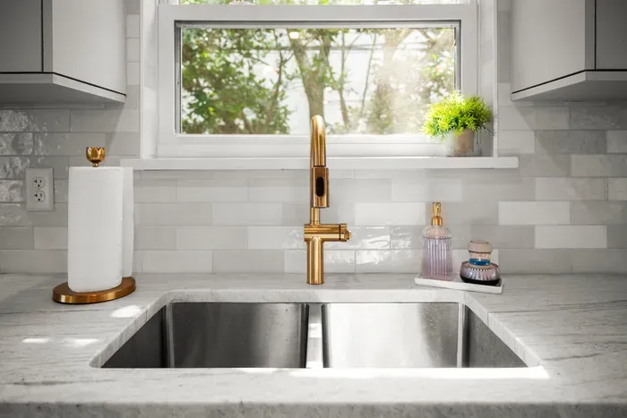 Modern sink with stylish finishes and plenty of space for easy meal prep and cleanup.