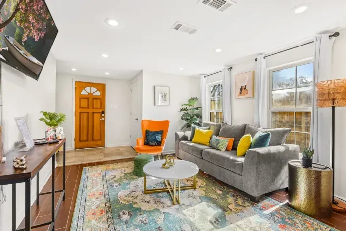 Watch movies with friends and family in the spacious living room downstairs.