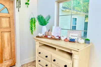 A festive display of pumpkins and colorful fall décor adds a fun and welcoming touch to your stay.