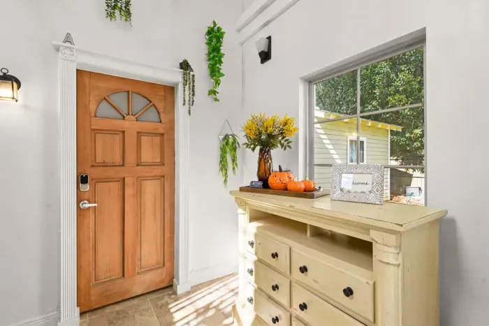A bright and inviting entryway to welcome you home—natural light, cozy details, and thoughtful touches from the moment you arrive.