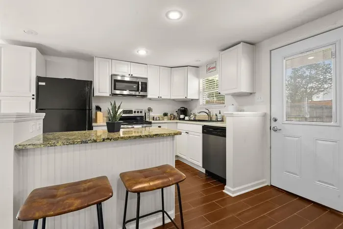 Cook a full meal in this full kitchen for the family.