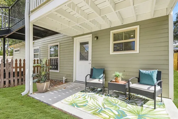 Enjoy the sun melting into the horizon on the back covered patio.