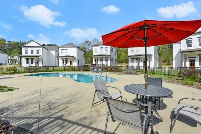 Convenient pool between the 2 homes make it easy to keep an eye on kids & easy access.