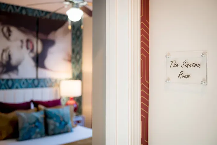 Bedroom 2 The Sinatra Room: A comfy, fun and provocative room with en-suite bathroom.