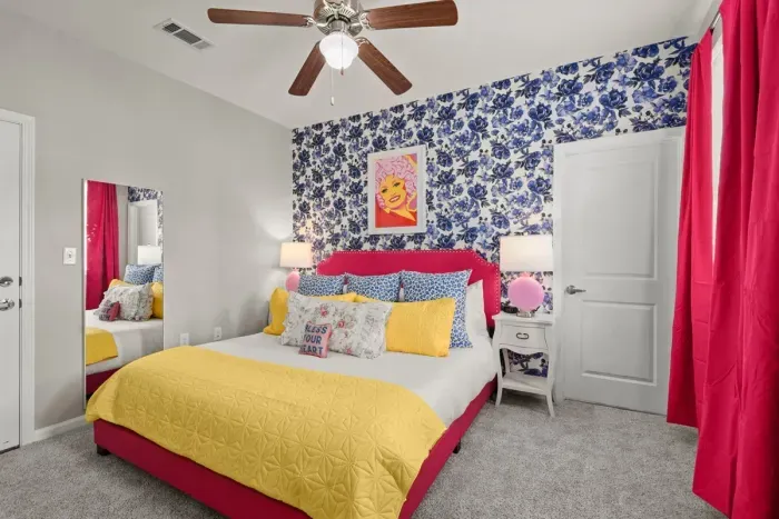 Bedroom 3 The Southern Belle room: This Dolly Parton designed room is such an amazing stay with its amazing colors and design.
