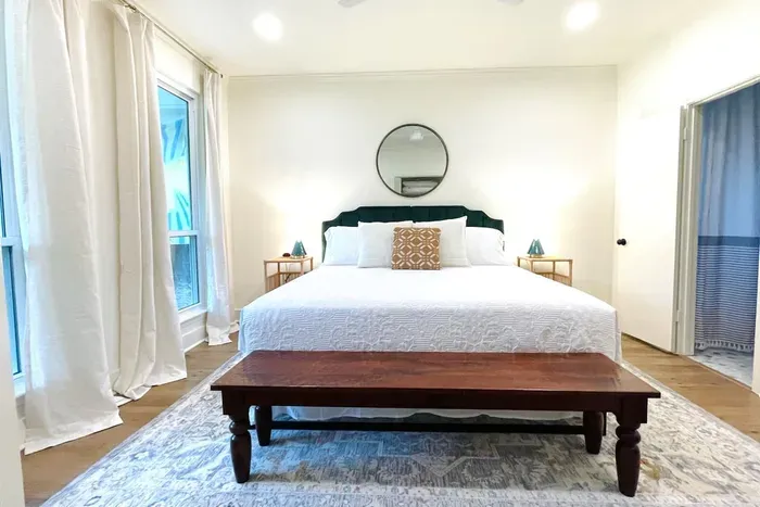 Welcome to the "Green Room" appointed with a king memory foam mattress and comfortable brand new bedding. This room is located in the front of the house with direct access to the hall bathroom.