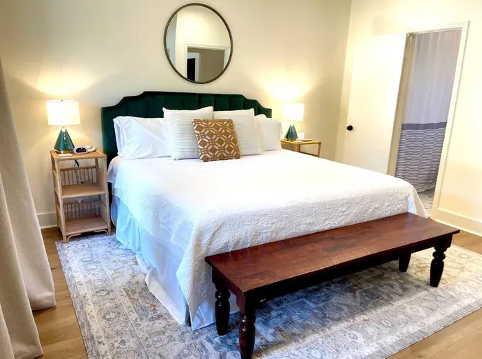 Enjoy a peaceful night’s sleep in this inviting bedroom with a comfortable bed, fresh linens, and a calm space designed for relaxation and comfort throughout your stay.