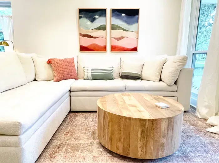 The spacious living room offers the perfect place to unwind during your stay.