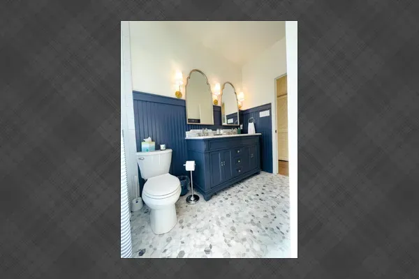 Refresh and recharge in the clean, comfortable bathroom featuring modern fixtures