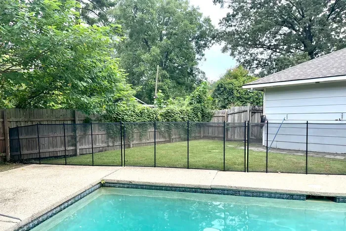 Take a dip in the private fenced pool, the perfect place to cool off, relax, and enjoy time outdoors.