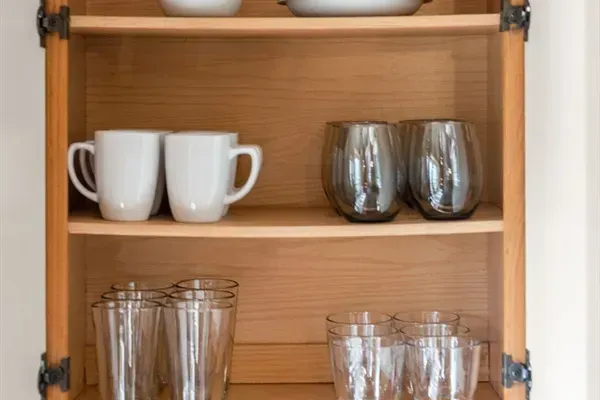 Savor your favorite beverages in this home, where a collection of mugs meets your daily needs.