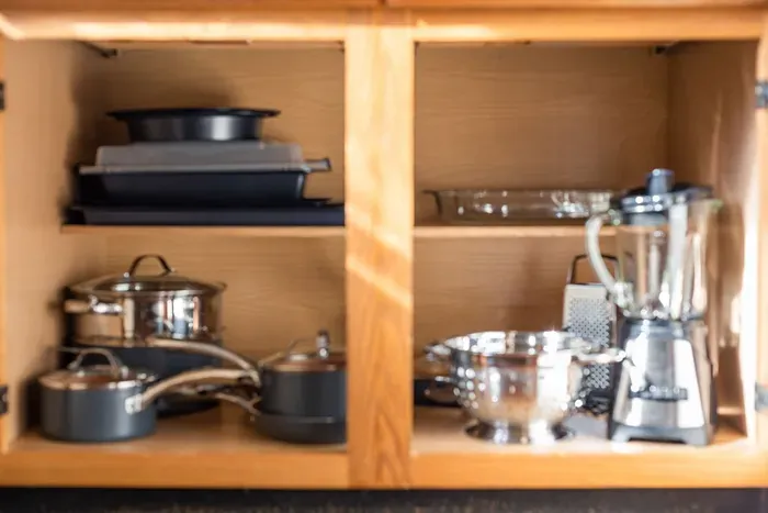 Embark on culinary adventures in this well-equipped kitchen, boasting essentials and ample storage.