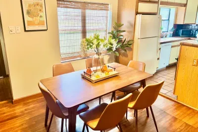Colorful pumpkins add a warm and festive touch to the dining table.