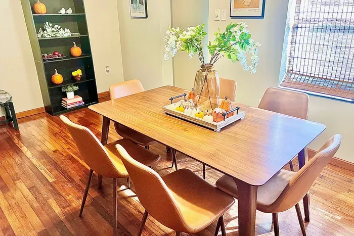 A cheerful pumpkin display creates a cozy setting for autumn meals and gatherings.