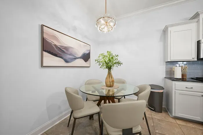 A charming dining nook with comfortable seating, natural light, and easy access to the kitchen.
