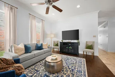 Comfortable seating, a large TV, and a welcoming atmosphere make this the perfect spot to unwind.