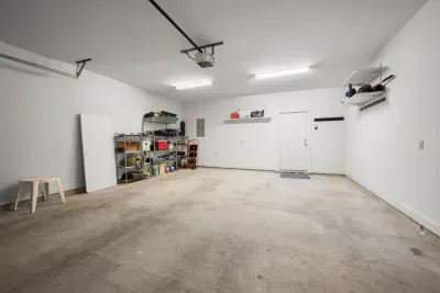 A large private garage offering convenient parking and additional storage space.