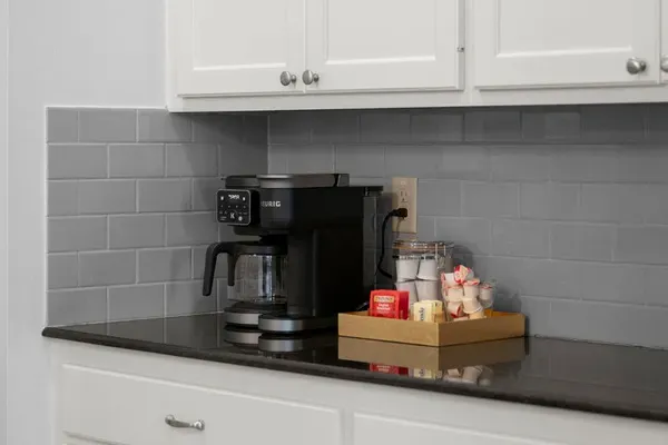 Enjoy your favorite brew from the convenient coffee station, ready for your morning routine.