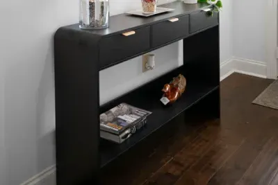 Elegant details and practical storage add a welcoming touch to the entryway.
