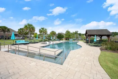 Make a splash at the community pool, complete with comfortable seating and a relaxing poolside atmosphere.