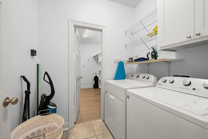 Convenient in-home laundry area with a washer, dryer, and everything you need for your stay.