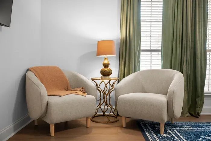 A cozy sitting nook, perfect for enjoying your morning coffee or relaxing with a good book.