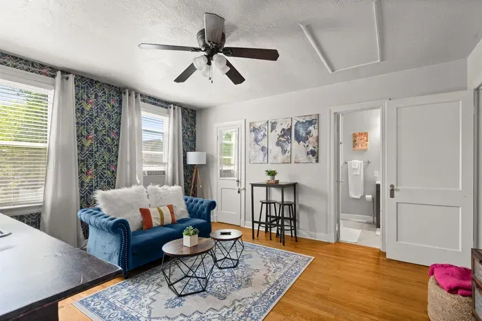 Enjoy a spacious living room with great lighting to watch some tv.