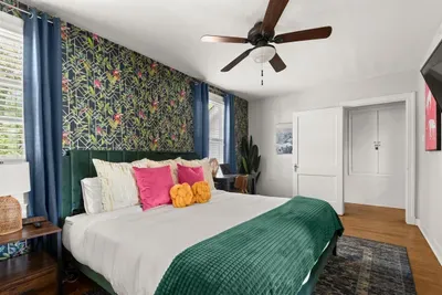 Extravagant wall paper to brighten the room.