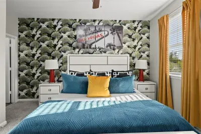 Immerse yourself in a vibrant oasis of tranquility, as the captivating blue and yellow color combination in this room evokes a sense of relaxation and joy