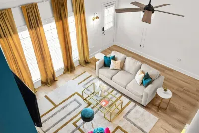 Designer grand area as seen after ascending the staircase.