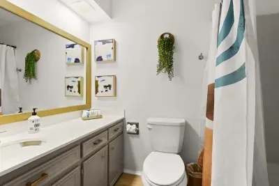 Secluded upstairs full bathroom with full shower & bathtub.