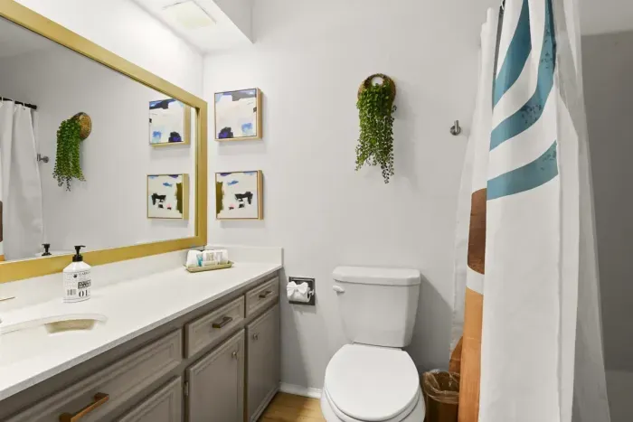 Secluded upstairs full bathroom with full shower & bathtub.