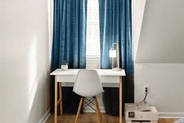 Dedicated guest bedroom work space.