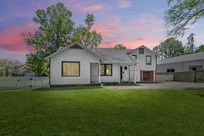 Welcome to the sprawling Bamboo Estate, a gated 1 acre mid century modern themed property in the center of town.