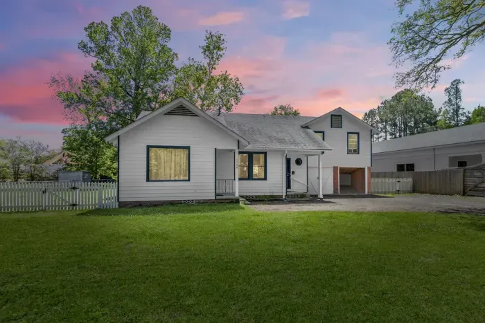 Welcome to the sprawling Bamboo Estate, a gated 1 acre mid century modern themed property in the center of town.