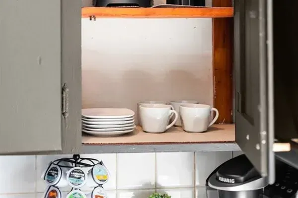 Coffee bar items and blender.