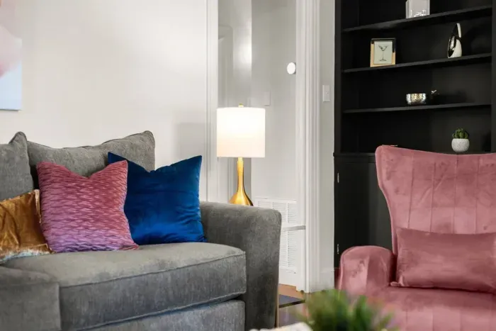 Designer pillows accent the space for a comfy feel.