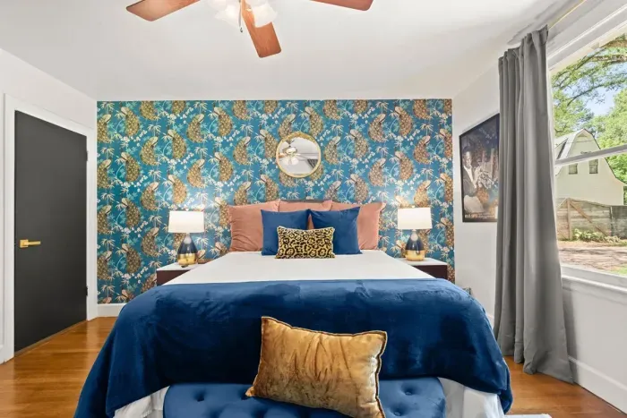 Drift into dreamland on the luxurious bed adorned with meticulously designed pillows, offering unparalleled comfort and exquisite style for a night of blissful sleep.