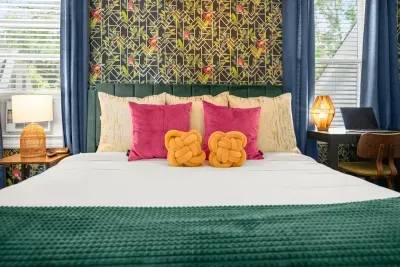 Experience the complete charm of the third bedroom in a single glance, where every detail comes together to create a serene and inviting sanctuary for rest and relaxation.