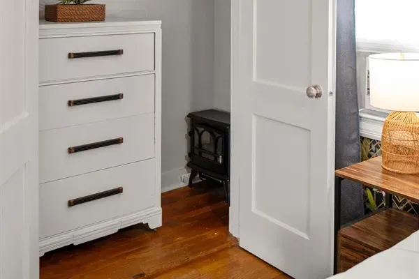 Double door closet with lots of storage.
